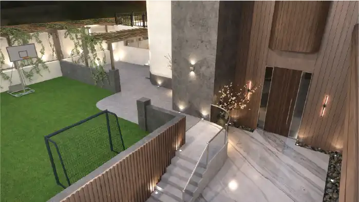 Elevated night view of a villa courtyard with green artificial lawn, a football goal and basketball hoop, a timber-slat entrance wall, a textured concrete panel, stone steps with a glass and steel balustrade, and recessed uplights and wall-washers