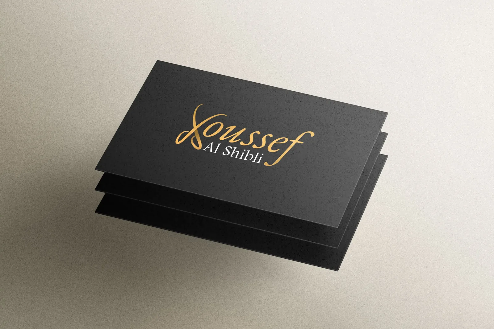 Youssef Al Shibli gold-on-black business card