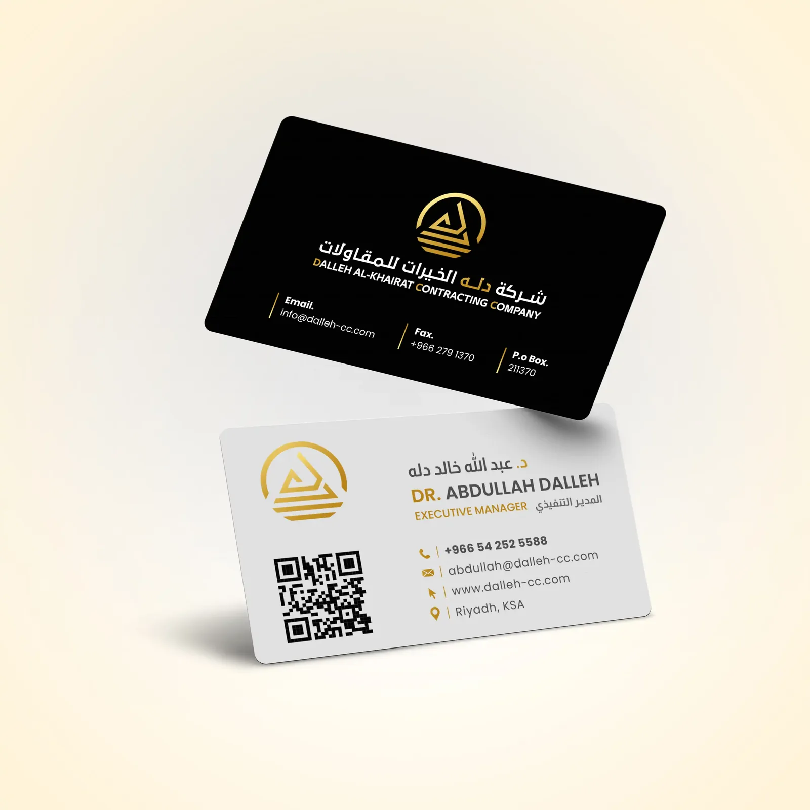 Gold-on-black business card with Arabic and English sides