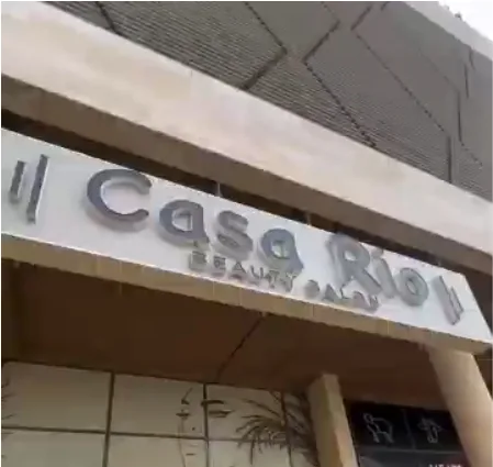 Beauty salon branding Dubai: Casa Rio rose-gold channel letters on the facade, close-up