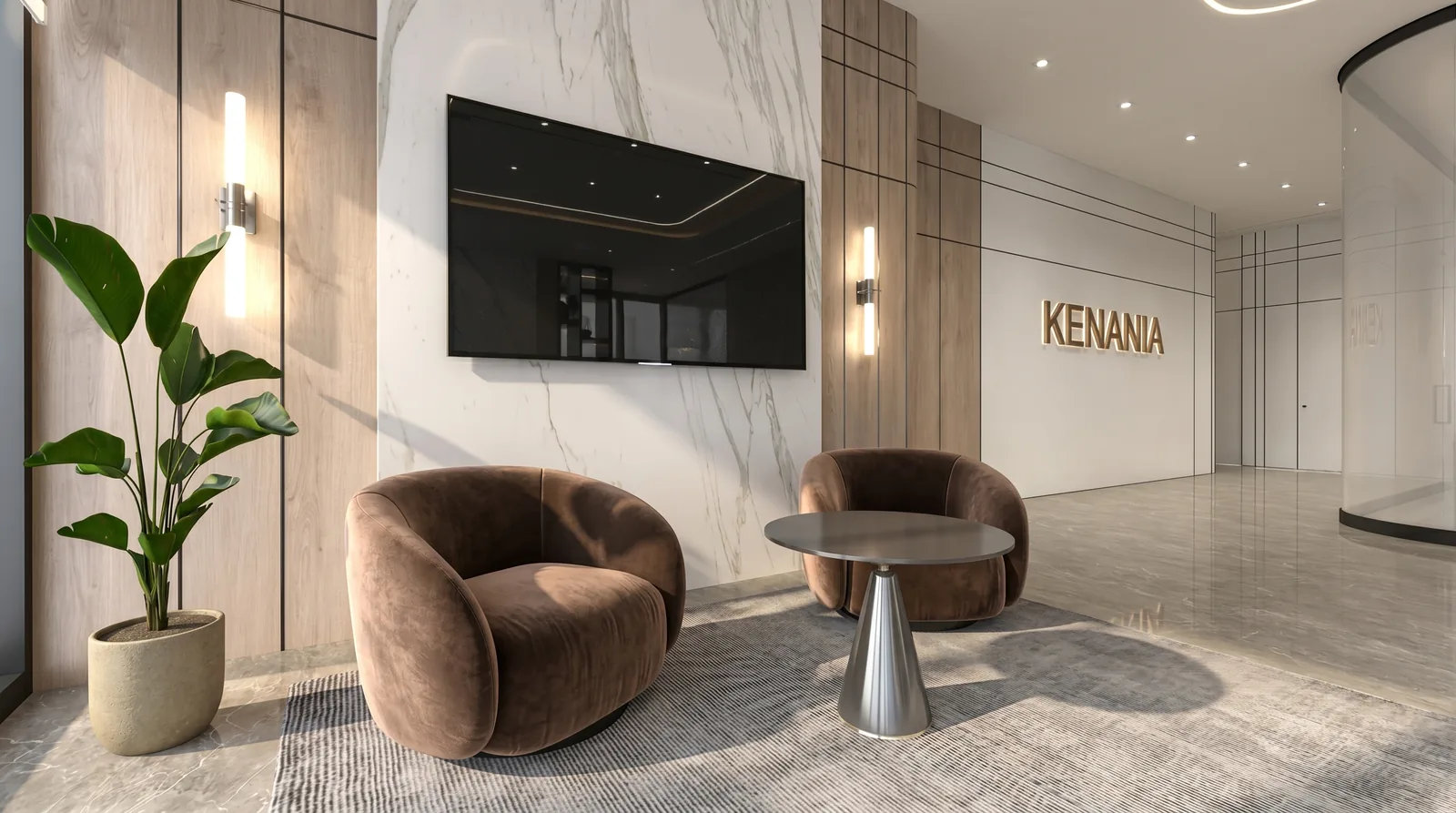 Waiting lounge with velvet armchairs and a marble feature wall