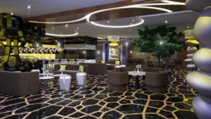 Hotel Lounge, Banquet Hall and Private Dining: One Floor, Three Moods | Kenania Inventive Arts Hotel lounge restaurant with a black-and-gold hexagonal floor and sculptural columns