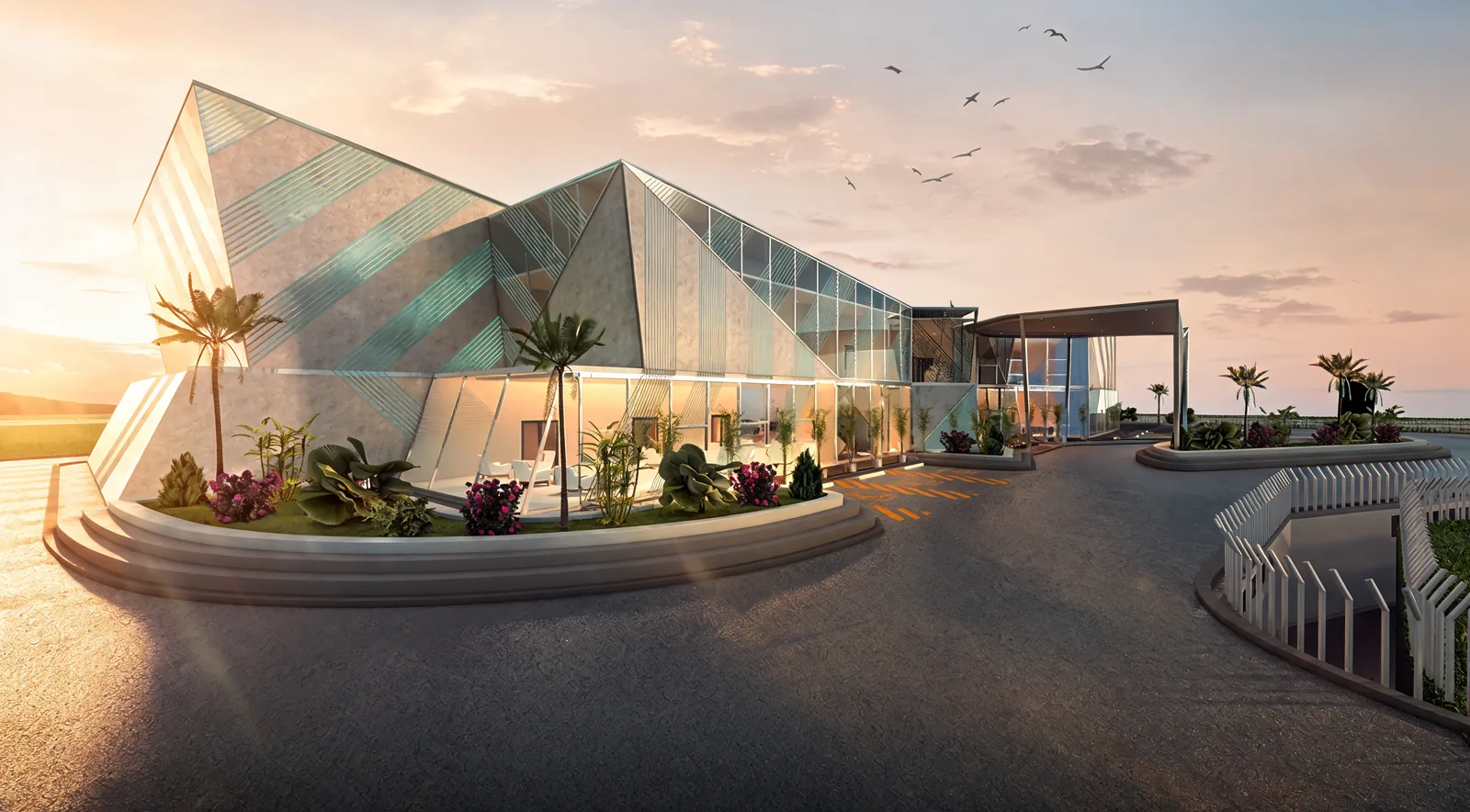 Clubhouse Design in Malaysia: Faceted Glass Pavilions Around a Garden Plaza | Kenania Inventive Arts Arrival drive curving around a raised planter to the glazed entrance