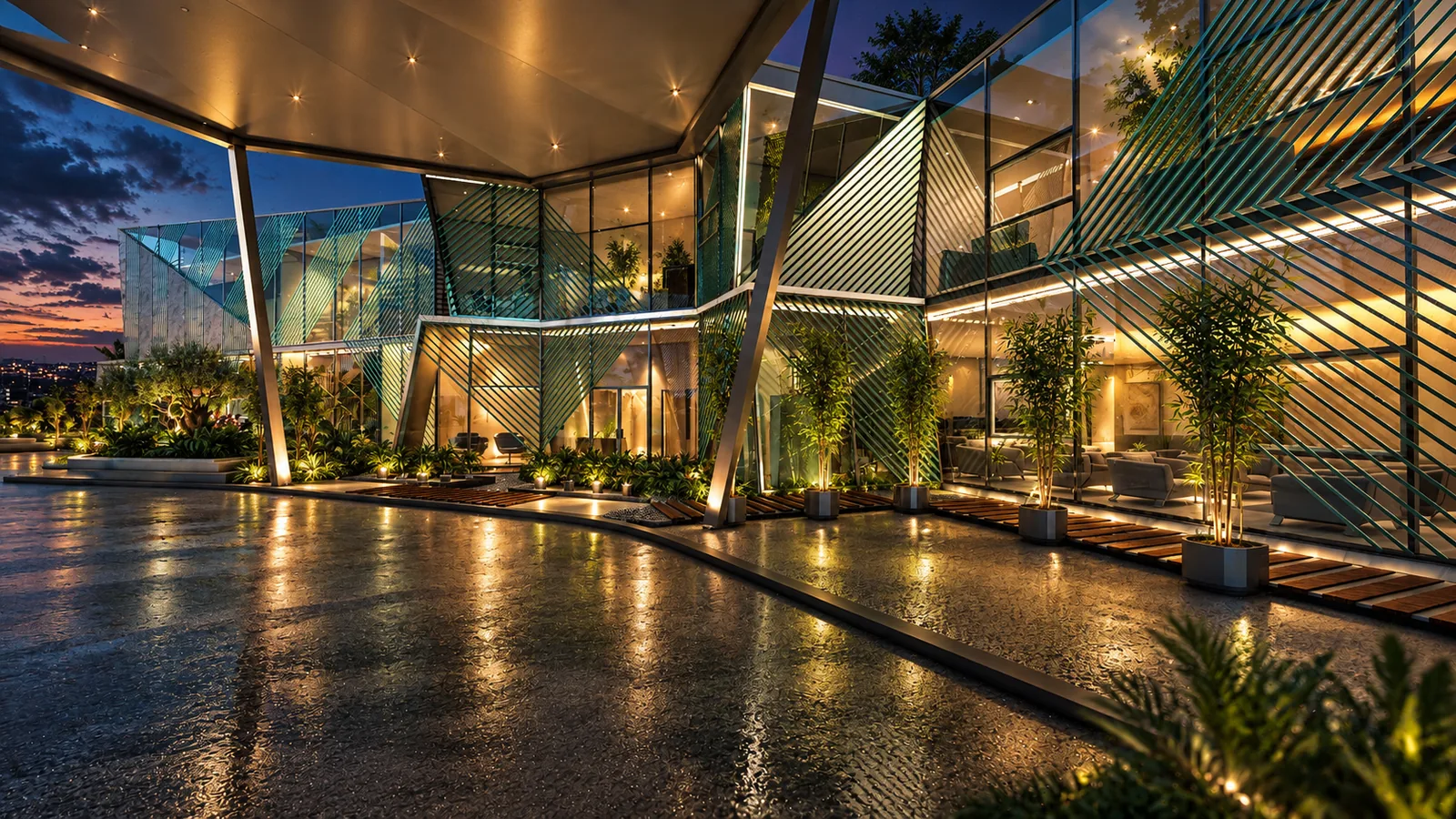Clubhouse Design in Malaysia: Faceted Glass Pavilions Around a Garden Plaza | Kenania Inventive Arts Night view along the glazed facade with diagonal screens and water reflecting the lights